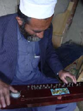 Rebab player (Linda Mazur)